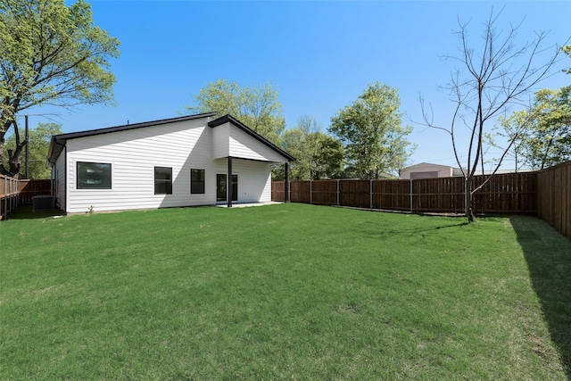 4515 Eutopia St, Greenville, TX 75401 - back of property with a yard and a fenced backyard