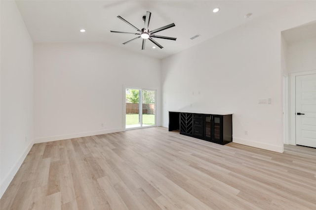 4515 Eutopia St, Greenville, TX 75401 - unfurnished living room featuring light wood-style flooring, recessed lighting, ceiling fan, visible vents, and high vaulted ceiling