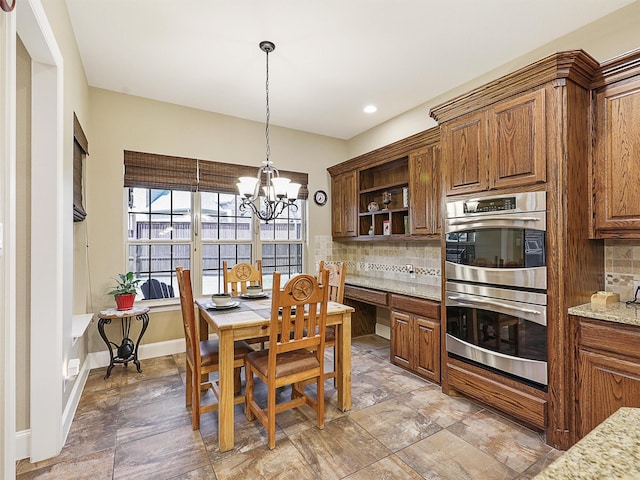 741 Butchart Dr, Prosper, TX 75078 - kitchen with double oven, backsplash, a chandelier, open shelves, and recessed lighting