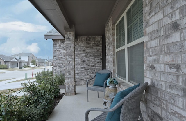 balcony featuring covered porch