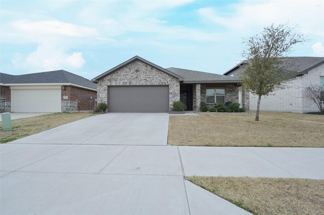 ranch-style home featuring an attached garage, a front lawn, concrete driveway, stone siding, and brick siding