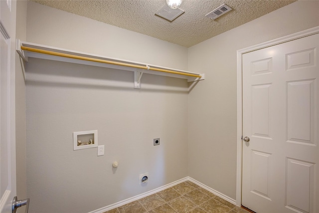 laundry area featuring electric dryer hookup, washer hookup, laundry area, and visible vents