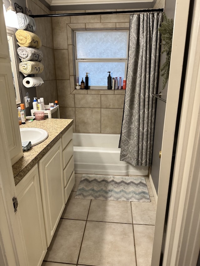 1704 S Houston St, Kaufman, TX 75142 - bathroom with tile patterned flooring, vanity, and shower / tub combo