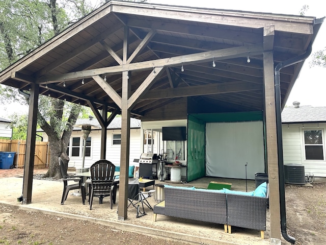 1704 S Houston St, Kaufman, TX 75142 - view of patio / terrace featuring an outdoor living space, central AC unit, and area for grilling