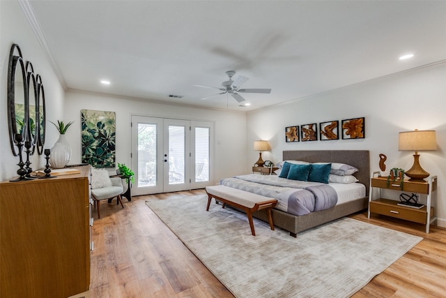 bedroom featuring recessed lighting, french doors, crown molding, light wood-style floors, and access to exterior