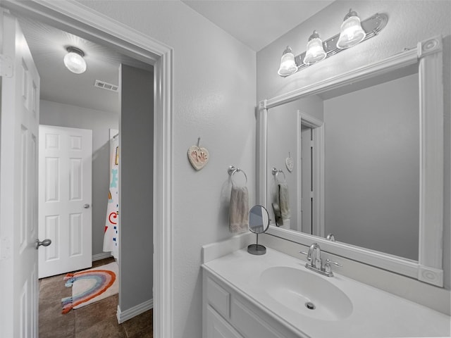 7601 Glenwood Springs Ln, Mckinney, TX 75070 - bathroom with vanity and visible vents
