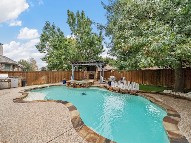 7601 Glenwood Springs Ln, Mckinney, TX 75070 - view of swimming pool featuring an outdoor kitchen, a pergola, a fenced backyard, and a patio area