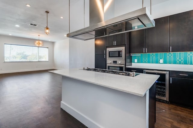 4609 Steel St, Dallas, TX 75219 - kitchen with visible vents, beverage cooler, backsplash, appliances with stainless steel finishes, and wall chimney exhaust hood
