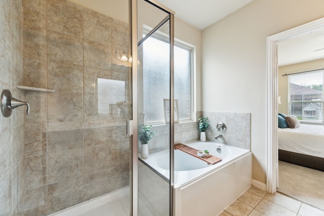 1605 Tahoe Trl, Prosper, TX 75078 - ensuite bathroom with tile patterned floors, a shower stall, ensuite bathroom, and a garden tub