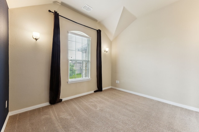 1605 Tahoe Trl, Prosper, TX 75078 - spare room with visible vents, carpet flooring, baseboards, and lofted ceiling