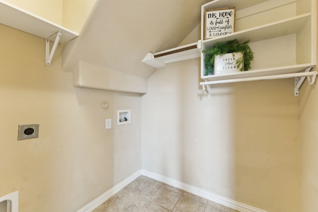 1605 Tahoe Trl, Prosper, TX 75078 - washroom with washer hookup, hookup for an electric dryer, laundry area, tile patterned flooring, and baseboards