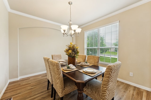 1605 Tahoe Trl, Prosper, TX 75078 - dining space with baseboards, a notable chandelier, ornamental molding, and light wood finished floors