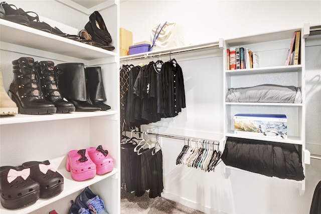 spacious closet featuring carpet floors