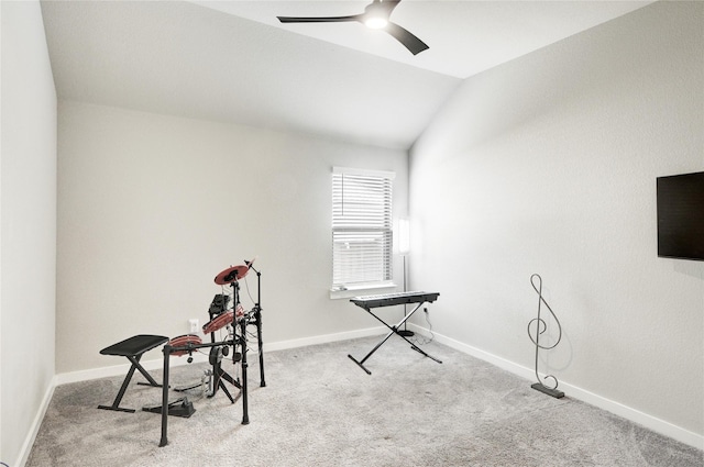 miscellaneous room featuring baseboards, a ceiling fan, carpet, and vaulted ceiling