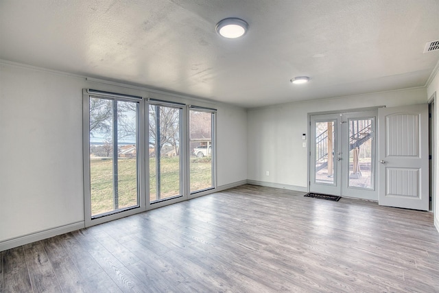 237 Runaway Bay Dr, Runaway Bay, TX 76426 - unfurnished living room with wood finished floors, high vaulted ceiling, and beamed ceiling