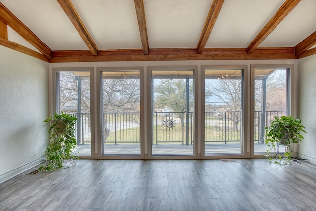 237 Runaway Bay Dr, Runaway Bay, TX 76426 - entryway with vaulted ceiling with beams, visible vents, a wealth of natural light, and wood finished floors