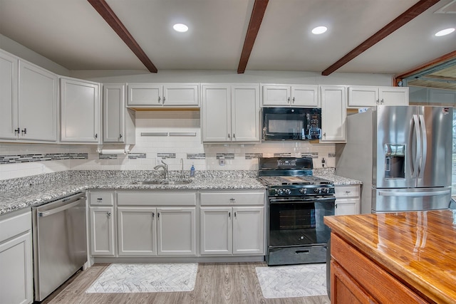 237 Runaway Bay Dr, Runaway Bay, TX 76426 - dining room with beam ceiling, visible vents, and light wood-style floors
