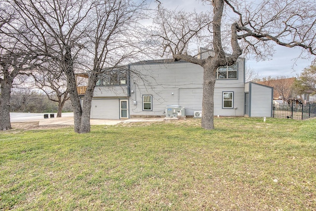 237 Runaway Bay Dr, Runaway Bay, TX 76426 - back of house with a lawn, a patio, and fence