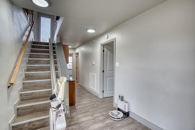 237 Runaway Bay Dr, Runaway Bay, TX 76426 - entryway with a textured wall, wood finished floors, and baseboards
