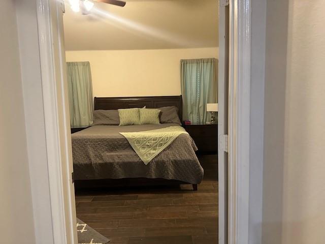 1615 Summerfield Dr, Allen, TX 75002 - bedroom featuring wood finished floors and ceiling fan