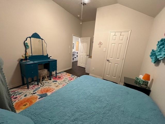 1615 Summerfield Dr, Allen, TX 75002 - bedroom with high vaulted ceiling, baseboards, and a ceiling fan