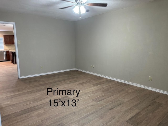 2612 Lemmontree Ln, Plano, TX 75074 - unfurnished room featuring wood finished floors, ceiling fan, and baseboards