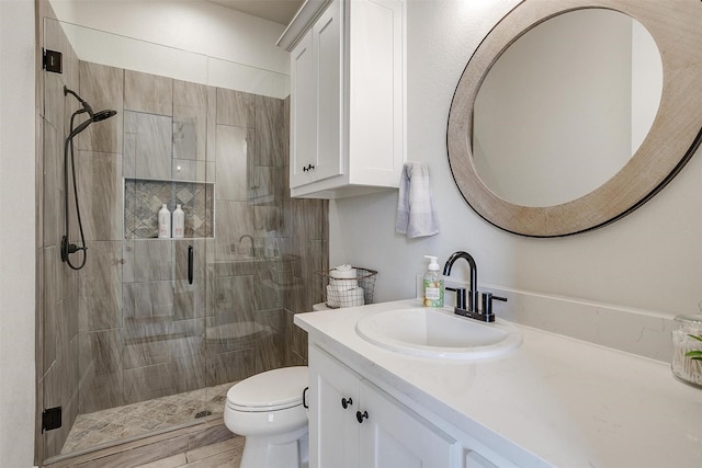 201 Flat Rock Ln, Weatherford, TX 76088 - full bathroom featuring a stall shower, vanity, and toilet