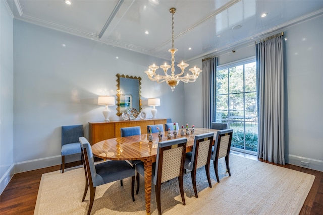 dining area with baseboards, wood finished floors, and ornamental molding