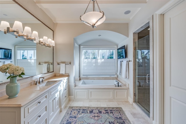 full bathroom with a bath, a shower stall, vanity, and crown molding