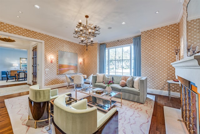 living room with wallpapered walls, wood finished floors, and ornamental molding