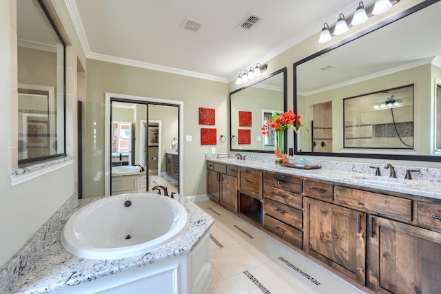 bathroom featuring double vanity, a sink, a tile shower, and visible vents