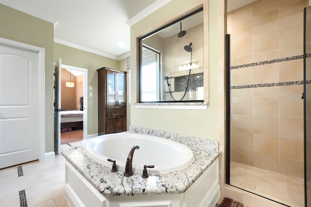 ensuite bathroom with tile patterned floors, crown molding, a garden tub, and a shower stall
