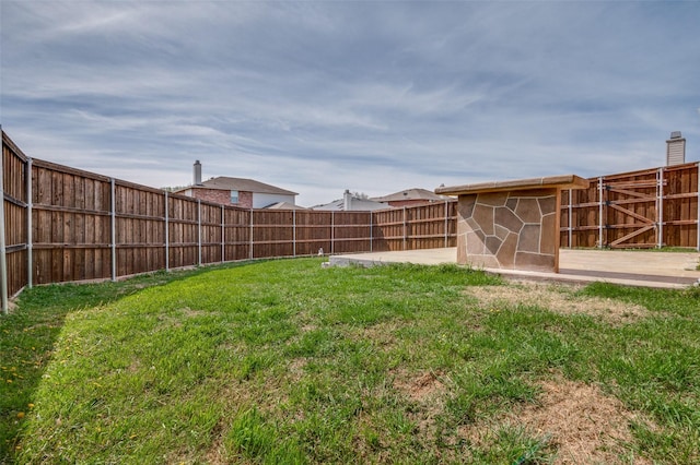 view of yard featuring a fenced backyard