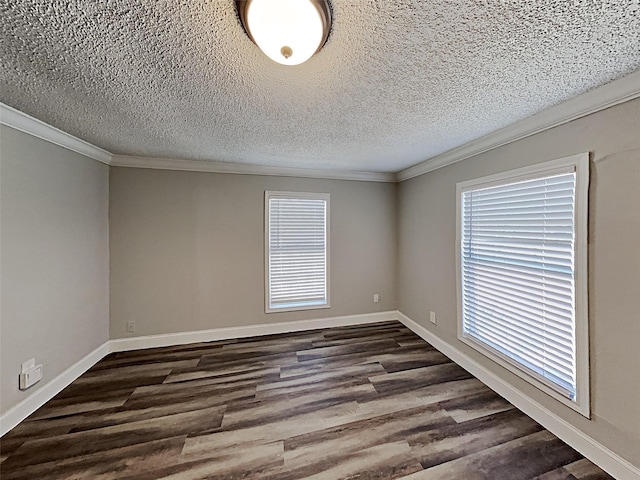 unfurnished room with a textured ceiling, dark wood-type flooring, baseboards, and ornamental molding