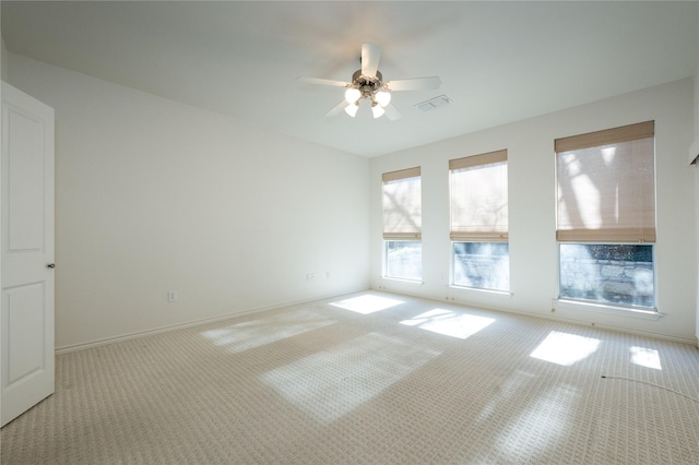 1505 Valley Creek Rd, Denton, TX 76205 - spare room featuring carpet, a ceiling fan, and baseboards