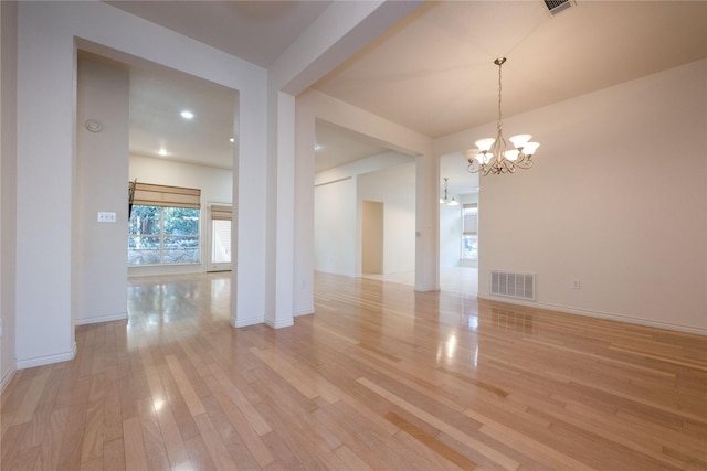 1505 Valley Creek Rd, Denton, TX 76205 - empty room featuring a chandelier, light wood-style flooring, baseboards, and recessed lighting