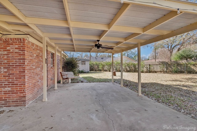 view of patio featuring an outbuilding and a fenced backyard