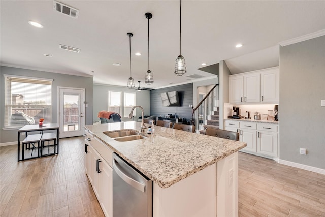 9032 Weepy Hollow Trl, Fort Worth, TX 76179 - kitchen featuring a sink, visible vents, stainless steel dishwasher, and light wood finished floors