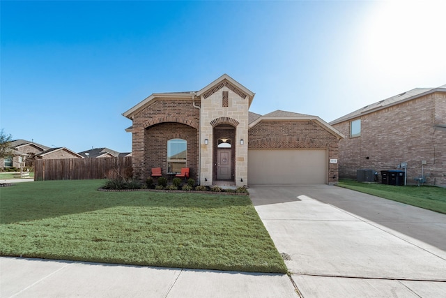 9032 Weepy Hollow Trl, Fort Worth, TX 76179 - french country style house with fence, concrete driveway, a front yard, a garage, and brick siding