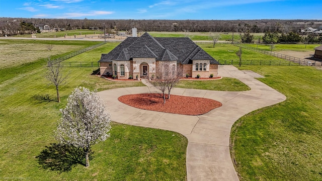 477 Horseshoe Bnd, Royse City, TX 75189 - view of front facade with curved driveway, stone siding, and brick siding