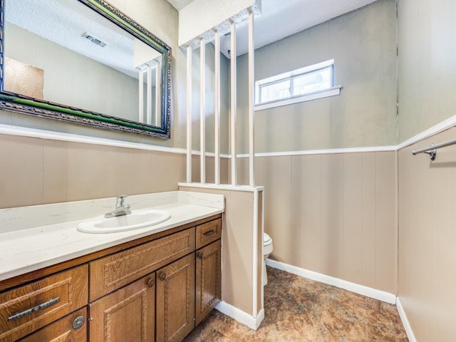 1805 Jamaica Ln, Sherman, TX 75092 - bathroom featuring vanity, toilet, and visible vents