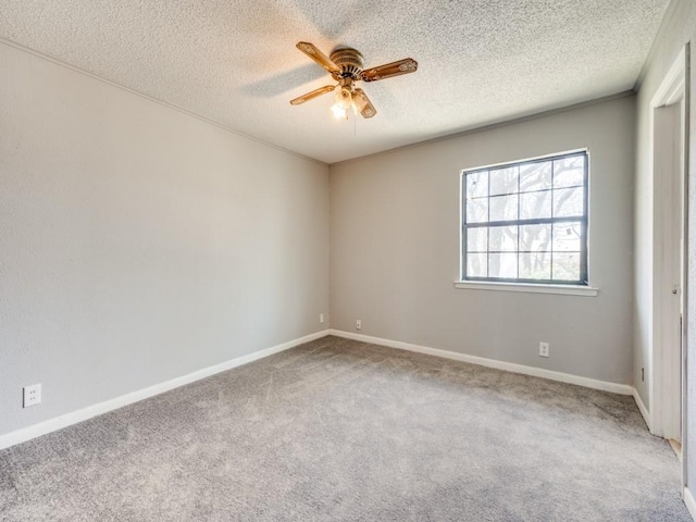 1805 Jamaica Ln, Sherman, TX 75092 - carpeted empty room with a ceiling fan, a textured ceiling, and baseboards