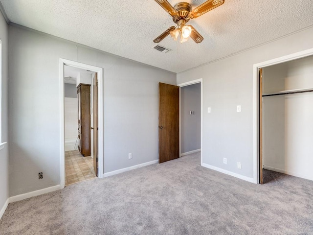 1805 Jamaica Ln, Sherman, TX 75092 - unfurnished bedroom featuring visible vents, carpet flooring, a textured ceiling, and a closet