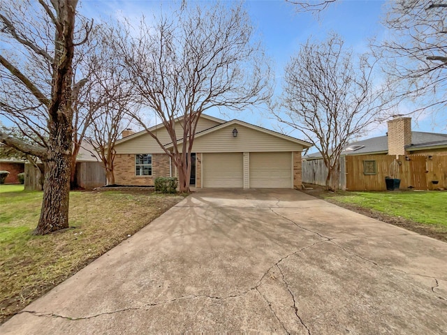 925 Old Mill Cir, Irving, TX 75061 - single story home with a front yard, brick siding, concrete driveway, an attached garage, and fence