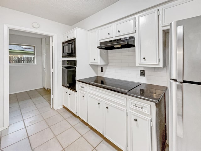 925 Old Mill Cir, Irving, TX 75061 - kitchen featuring white cabinetry, under cabinet range hood, black appliances, light tile patterned flooring, and backsplash