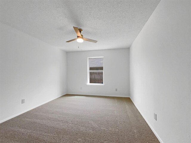 925 Old Mill Cir, Irving, TX 75061 - carpeted spare room with baseboards, a ceiling fan, and a textured ceiling