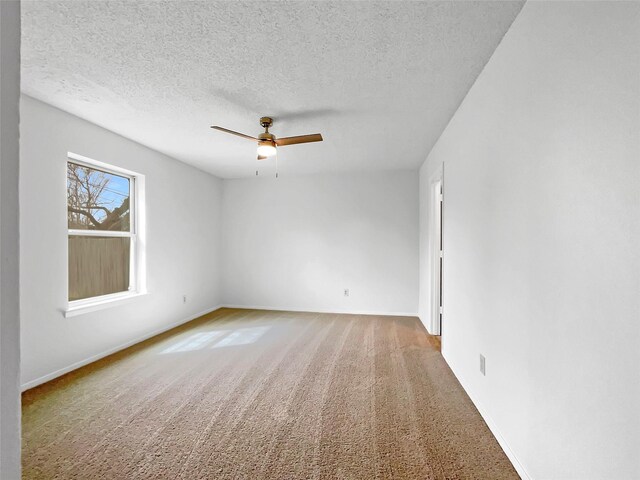 925 Old Mill Cir, Irving, TX 75061 - spare room with a textured ceiling, ceiling fan, carpet flooring, and baseboards