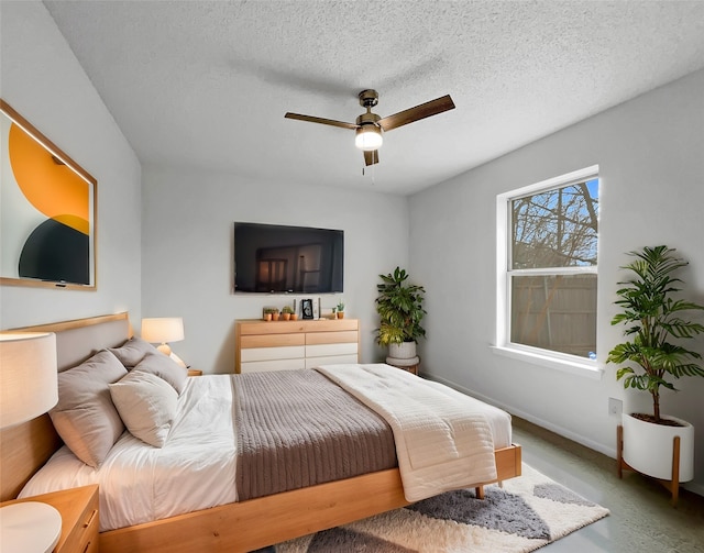 925 Old Mill Cir, Irving, TX 75061 - bedroom featuring a textured ceiling, ceiling fan, and baseboards