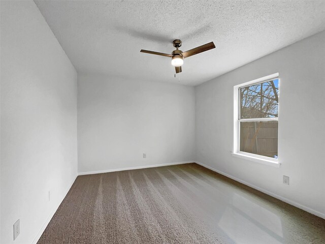 925 Old Mill Cir, Irving, TX 75061 - empty room with baseboards, a ceiling fan, a textured ceiling, and carpet floors