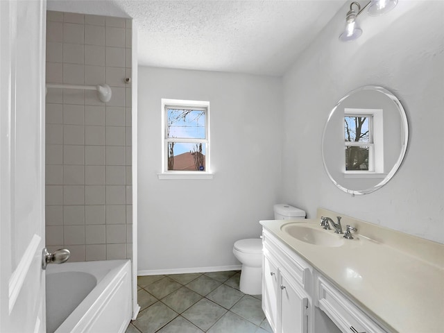 925 Old Mill Cir, Irving, TX 75061 - bathroom with vanity, toilet, a textured ceiling, baseboards, and tile patterned flooring
